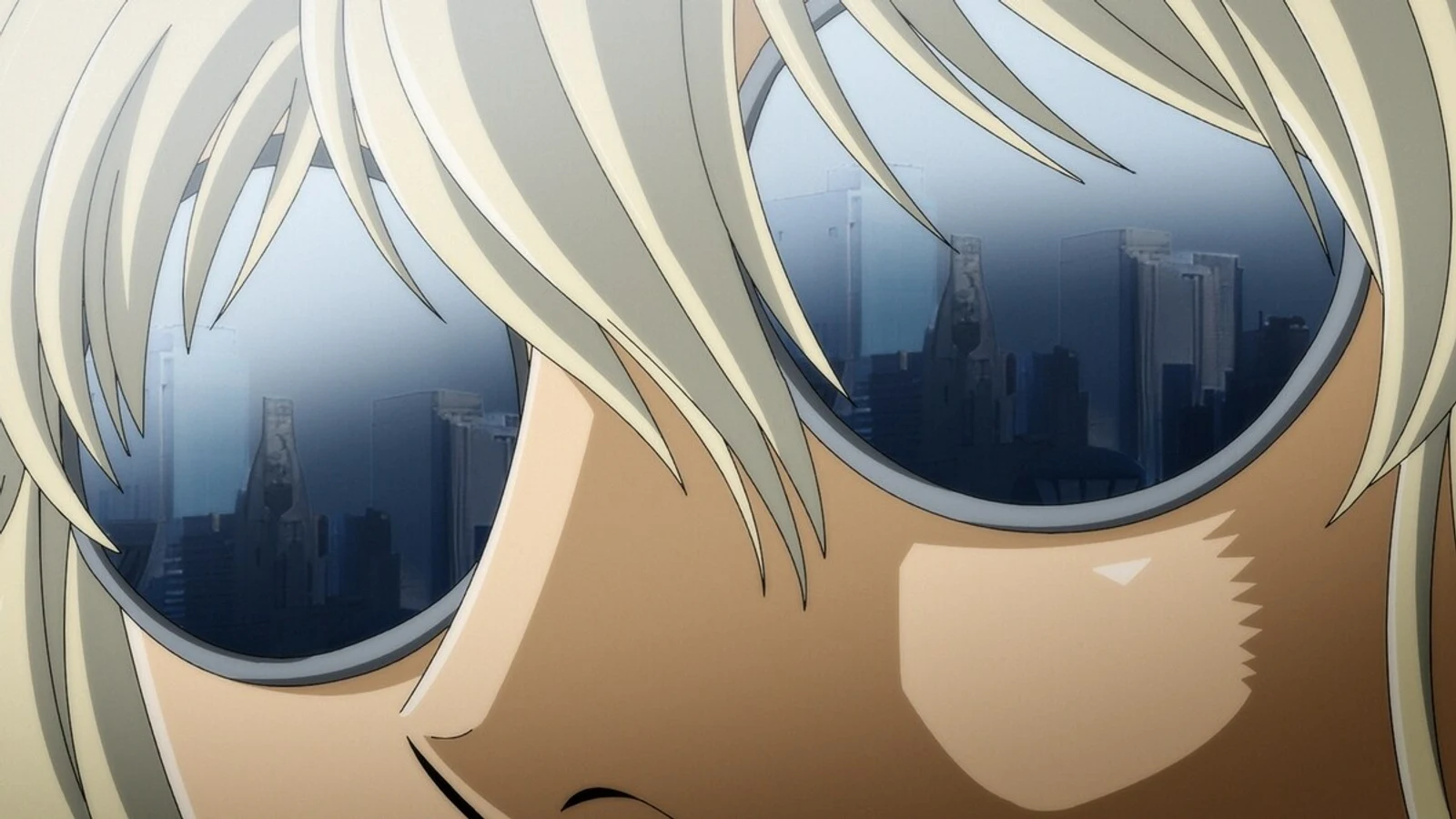 ©2026 Akihito Yoshitomi / EAT-MAN The Over Order Production Committee Close-up teaser trailer still from EAT-MAN The Over Order, showing Bolt Crank's sunglasses reflecting a cyberpunk city skyline.