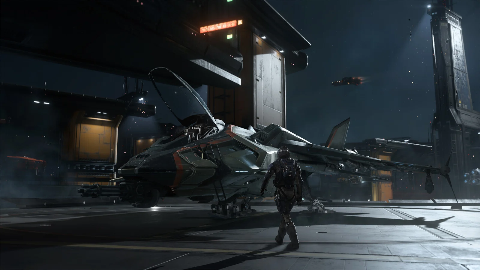 An armored figure approaches a spacecraft with an open canopy in an official Squadron 42 hangar screenshot.